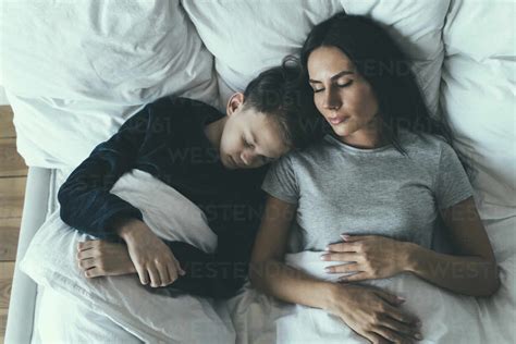 mum sleeping son sex|Mother And Son Sleeping In Bed stock videos and footage.